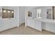 Bathroom featuring double vanity sinks and a walk-in shower at 11049 Concord Valley Drive, Las Vegas, NV 89135