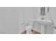 Powder room featuring pedestal sink and toilet at 11049 Concord Valley Drive, Las Vegas, NV 89135