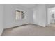 A bright bedroom featuring a modern window, closet, and a contemporary doorway at 11049 Concord Valley Drive, Las Vegas, NV 89135