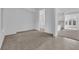 Bright and airy living room featuring plush carpeting, fresh paint, and lots of natural light at 11049 Concord Valley Drive, Las Vegas, NV 89135