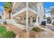 Home's backyard with a covered patio and gravel landscaping at 1109 Maserati Dr, Las Vegas, NV 89117
