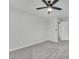 This bedroom has neutral walls, a ceiling fan, and carpet at 1109 Maserati Dr, Las Vegas, NV 89117