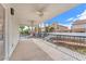 This home has a covered patio with ceiling fans and a view of the backyard at 1109 Maserati Dr, Las Vegas, NV 89117