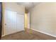 Bedroom featuring large closet with sliding doors and neutral paint throughout at 11228 Hedgemont Ave, Las Vegas, NV 89138