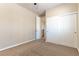 Bedroom with carpet, a window, and a closet offering ample storage space at 11228 Hedgemont Ave, Las Vegas, NV 89138