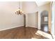Elegant dining room with high ceilings, chandelier, arched doorways and abundant natural light at 11228 Hedgemont Ave, Las Vegas, NV 89138