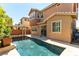 Home's pool with the back of the home and a patio area at 11228 Hedgemont Ave, Las Vegas, NV 89138