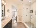 Contemporary bathroom with double vanity and a glass shower at 11278 Tenza Ct, Las Vegas, NV 89141