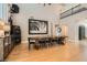 Large dining table with hardwood floors and high ceiling, adjacent to the kitchen area at 11278 Tenza Ct, Las Vegas, NV 89141