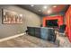 Home media room with comfortable seating and a large TV at 11278 Tenza Ct, Las Vegas, NV 89141