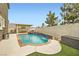Backyard swimming pool featuring waterfall detail, spa, and covered outdoor dining area at 11278 Tenza Ct, Las Vegas, NV 89141