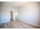 Bedroom featuring wood-look flooring and closet with an open door at 1620 Western Lily St, Las Vegas, NV 89128