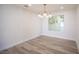 Cozy dining area features modern chandelier and bright natural light at 1620 Western Lily St, Las Vegas, NV 89128