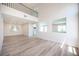 Bright, airy living room boasting hardwood floors and an open floor plan, perfect for entertaining at 1620 Western Lily St, Las Vegas, NV 89128