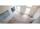 An aerial view showcasing living room with light wood flooring and many windows at 1620 Western Lily St, Las Vegas, NV 89128