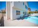 Inviting backyard pool featuring a patio for outdoor entertaining and relaxation at 1620 Western Lily St, Las Vegas, NV 89128