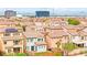 Panoramic aerial view showcasing a vibrant residential neighborhood, city skyline, with well-maintained landscaping at 1887 Hollywell St, Las Vegas, NV 89135