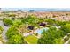 Aerial view of a neighborhood pool and community park at 1887 Hollywell St, Las Vegas, NV 89135