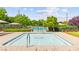 Relaxing community pool area with lounge chairs and shaded seating for residents at 1887 Hollywell St, Las Vegas, NV 89135