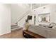 Spacious living room boasting high ceilings, lots of natural light, and an open floor plan with stair access at 1887 Hollywell St, Las Vegas, NV 89135