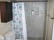 Bathroom featuring a shower with a floral curtain at 1927 Raspberry Hill Rd, Las Vegas, NV 89142