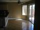 Breakfast nook features tile flooring, countertop and sliding glass door at 1927 Raspberry Hill Rd, Las Vegas, NV 89142