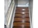 Staircase with hardwood steps at 1927 Raspberry Hill Rd, Las Vegas, NV 89142