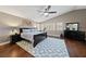 Spacious main bedroom with high ceilings, modern ceiling fan, and large windows at 2113 Waterbury Ln, Las Vegas, NV 89134