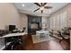 A spacious office space with hardwood floors, neutral walls, built-in shelving and ample lighting at 2113 Waterbury Ln, Las Vegas, NV 89134