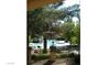 View of the refreshing community pool area, surrounded by lush greenery and offering a tranquil escape for residents at 2200 S Fort Apache Rd # 2062, Las Vegas, NV 89117
