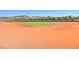 Well-kept baseball field with clay infield, ideal for sports enthusiasts and community events at 2445 Rue Royale, Henderson, NV 89044
