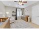 Cozy Bedroom with crib, reading chair, and dresser at 2445 Rue Royale, Henderson, NV 89044