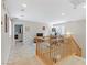 Bright bonus room with neutral walls, shutters, and staircase with wooden railings at 2445 Rue Royale, Henderson, NV 89044