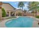 Resort-style pool and outdoor living space for relaxing and entertaining in a private backyard at 2445 Rue Royale, Henderson, NV 89044
