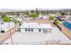 Aerial view of the home showing the gravel landscaping, fresh exterior paint, and the carport at 266 Tungsten St, Henderson, NV 89015