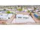 Aerial view of white single story home with gravel landscaping and mountain views at 266 Tungsten St, Henderson, NV 89015