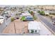 An aerial view of the home showcasing the surrounding neighborhood, nearby street, and the lot size at 266 Tungsten St, Henderson, NV 89015