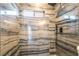 Beautiful shower with marble tile and a rainfall shower head, and a window at 266 Tungsten St, Henderson, NV 89015
