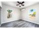 This is a bedroom with gray flooring and a split-air conditioning system at 266 Tungsten St, Henderson, NV 89015