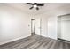 Bright bedroom featuring hardwood floors, ceiling fan, and closet at 266 Tungsten St, Henderson, NV 89015