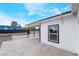Side view of the home featuring a large carport and low-maintenance gravel landscaping at 266 Tungsten St, Henderson, NV 89015