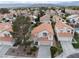 Aerial view of a two-story home with a well-maintained front yard and an attached two-car garage at 2753 Devita Cir, Las Vegas, NV 89117