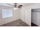 Bedroom with ceiling fan, closet, and neutral carpet at 2753 Devita Cir, Las Vegas, NV 89117