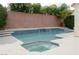 Inviting backyard pool and spa area with blue tile accents, perfect for outdoor relaxation at 2753 Devita Cir, Las Vegas, NV 89117