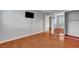 Bedroom featuring wood-look floors and a mirrored closet at 281 Powerbilt Ave, Las Vegas, NV 89148