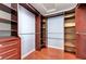 Walk-in closet featuring custom shelving and rods, providing ample storage solutions at 281 Powerbilt Ave, Las Vegas, NV 89148