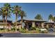 Upscale community clubhouse with stone accents, lush landscaping, and ample parking at 281 Powerbilt Ave, Las Vegas, NV 89148