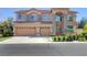 Spacious two-story home with a three-car garage and stone accents at 281 Powerbilt Ave, Las Vegas, NV 89148