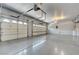 Spacious three car garage with finished walls and floor at 281 Powerbilt Ave, Las Vegas, NV 89148