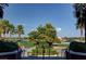 Picturesque golf course view framed by palm trees and lush greenery, creating a serene atmosphere at 281 Powerbilt Ave, Las Vegas, NV 89148